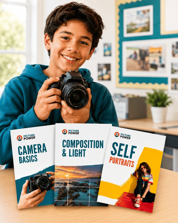 Young photography student holding a camera with Picture Power teaching resources